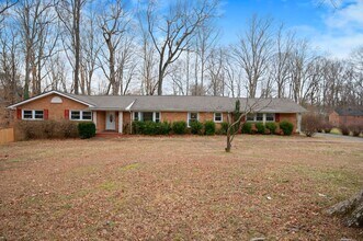 Building Photo - Spacious 4BR (or 3BR + Bonus) with 2 Living Rooms, Screened Porch & 4-Car Garage