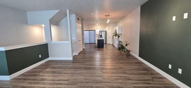 Building Photo - Come check out this beautiful 3 story town...