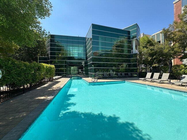 Building Photo - Luxury guard-gated mid-rise Manhattan Cond...