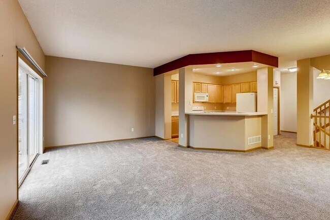 Building Photo - Bright End-Unit 2BD Townhome with Fireplace, Deck & Big Bedrooms