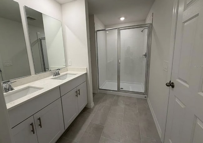 Building Photo - "Spacious 3-Bedroom Townhouse with Granite Elegance in St. Cloud – 4543 Rangeland Way"