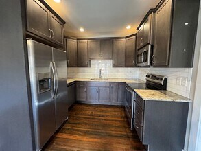 Building Photo - 201 East Fifth Street-201