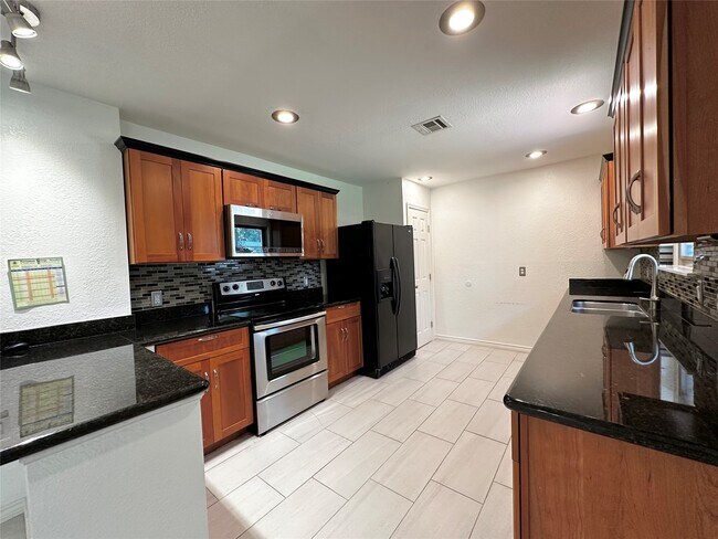 Building Photo - 9626 Highmeadow Dr