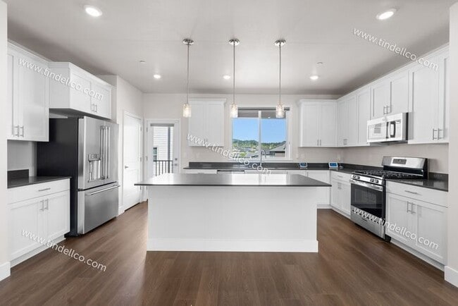 Building Photo - 3 Bedroom 2.5 Bathroom Stunner with Covered Patio and Attached Garage in River Terrace Town Cente...