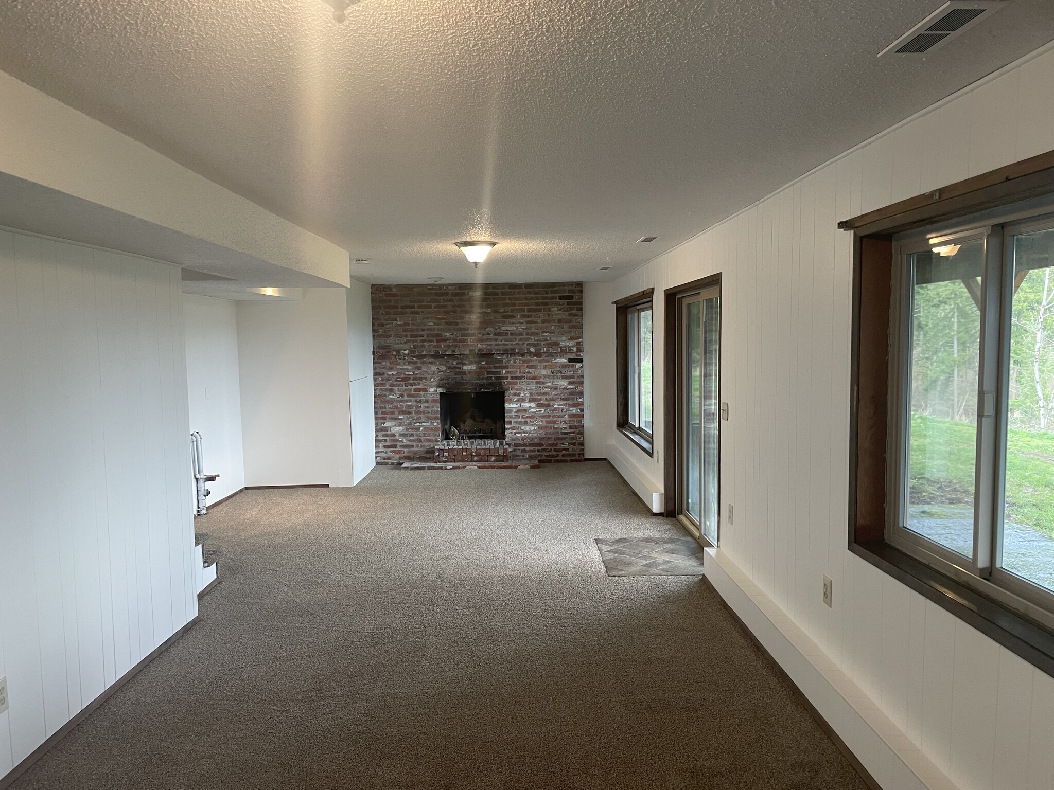 Basement Great Room w/ Fireplace - 17135 SE Royer Rd