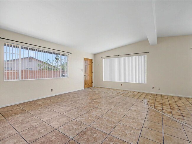 Building Photo - Charming 3-Bedroom Home with Spacious Yard & Versatile Storage!