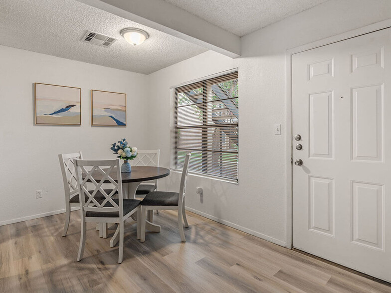 Dining Area with Wood Style Flooring - Saddlecreek Apartments