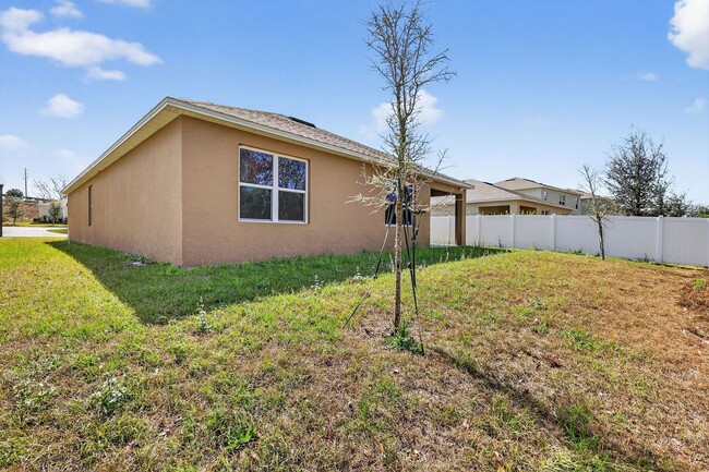 Building Photo - Available Now in Tavares | 2023 Built 4BR/2BA Home with 2-Car Garage