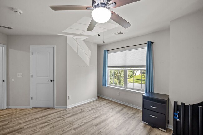 Building Photo - Relax by the Water – 4BR Home with Pond Views in Creekside