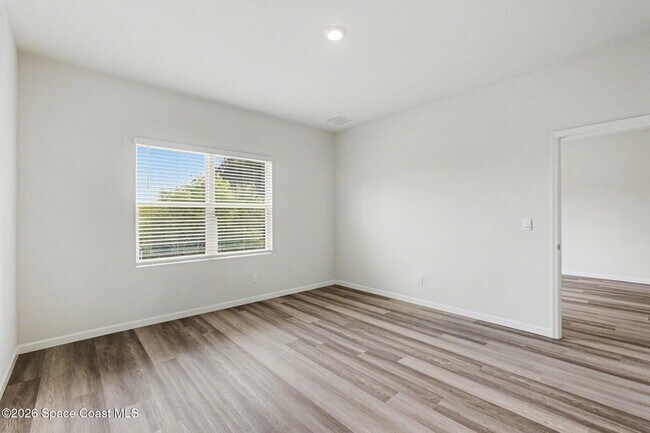 Building Photo - 8995 Orchid Reserve Cir