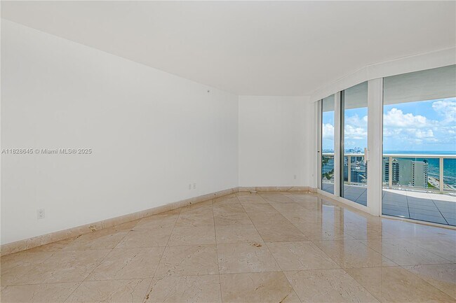 Building Photo - 4779 Collins Ave