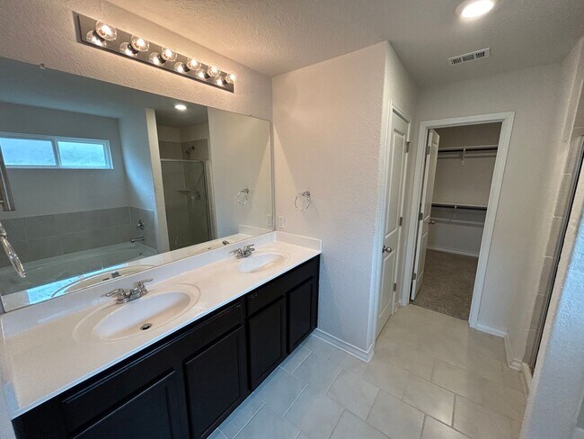 Building Photo - *COMING SOON* 3-Bedroom with Solar Panels & Resort Amenities – Pool, Gym!