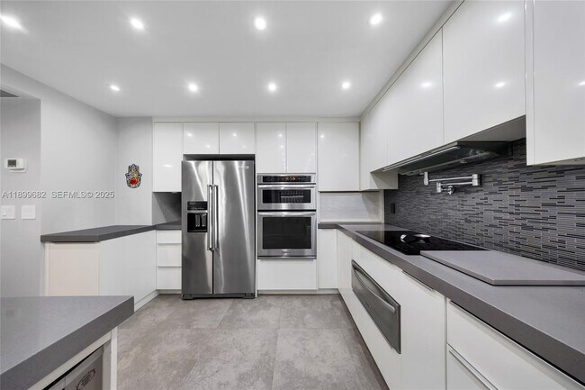 Building Photo - 9801 Collins Ave