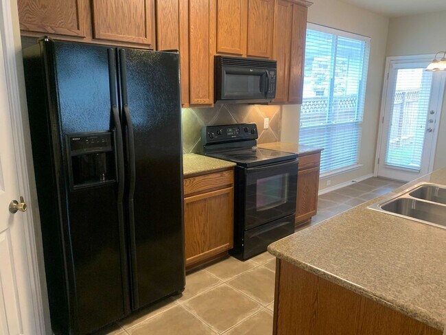 Building Photo - *COMING SOON* Gated Community: 3-Bedroom with Upstairs Loft, Fenced Backyard & Prime Location!