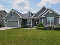 Building Photo - Four Bedroom Three Bath Single Family Home