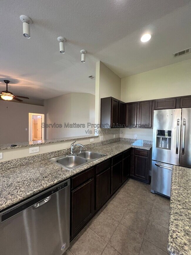 Building Photo - 7045 Harvest Way