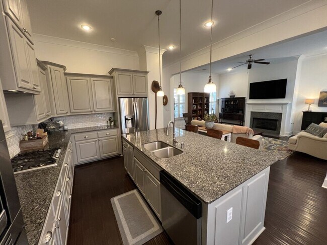 Building Photo - Luxury 4BR Home in Americana | 11 Ft Ceilings, Courtyard Living & Furnished Option at $3,950
