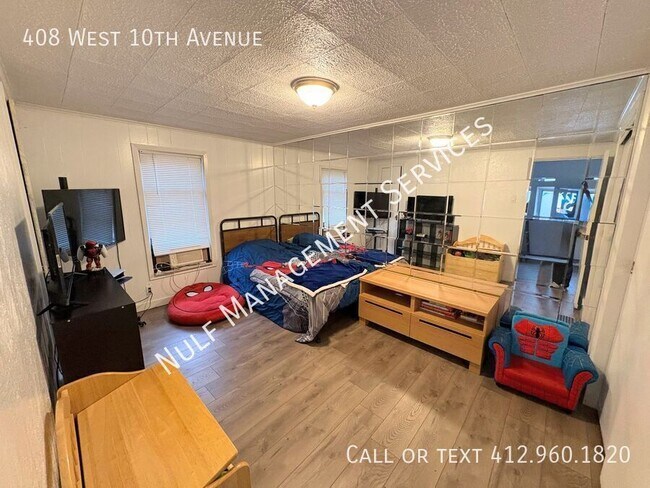 Building Photo - 408 W 10th Ave