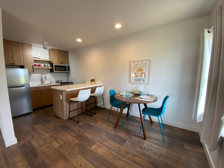 Example of a dining/kitchen area layout. Unit is rented unfurnished. - 575 Greenwood Ave