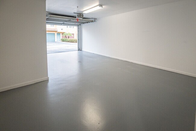 Building Photo - Available for Immediate Move in!  Gorgeous 2 Bedroom Condo with Garage on the 1st Floor!