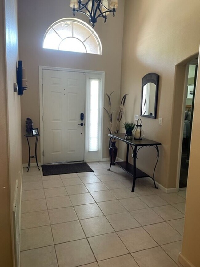 Building Photo - Lakefront 3-Bedroom Pool Home in Gated Com...