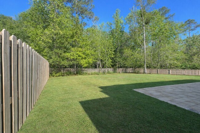 Building Photo - Highly Desirable 4 Bedroom Home with Serene Cul-de-Sac Living in Watergrass Community