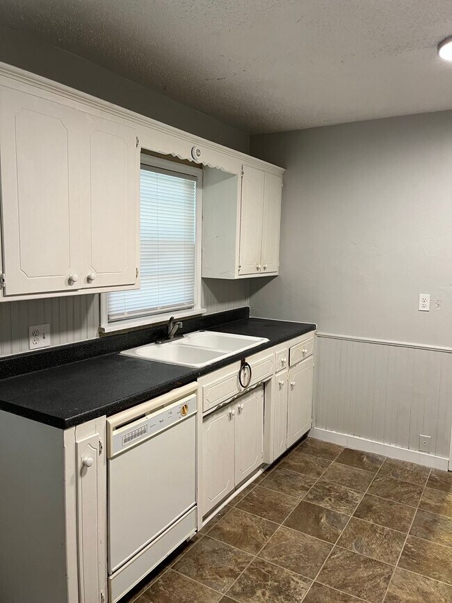 Building Photo - Step inside!  You will love what you see. COMING SOON