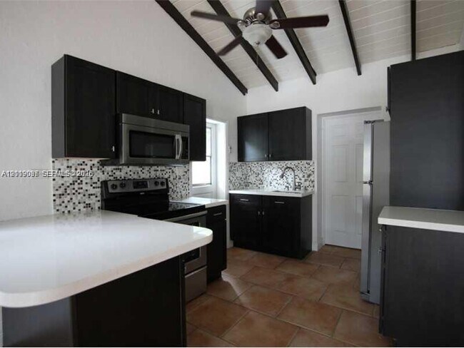 Building Photo - 7975 Sunset Dr
