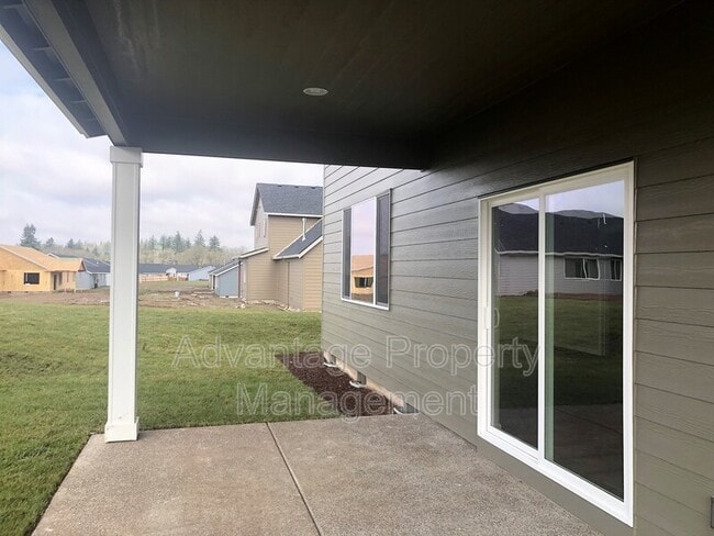 Building Photo - 5836 NE Chandra Ct