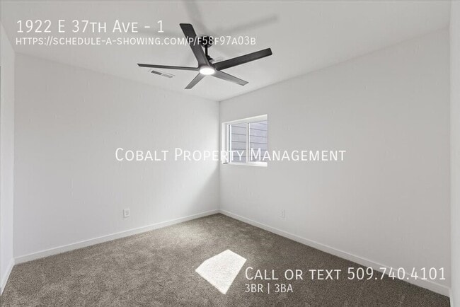 Building Photo - 1922 E 37th Ave
