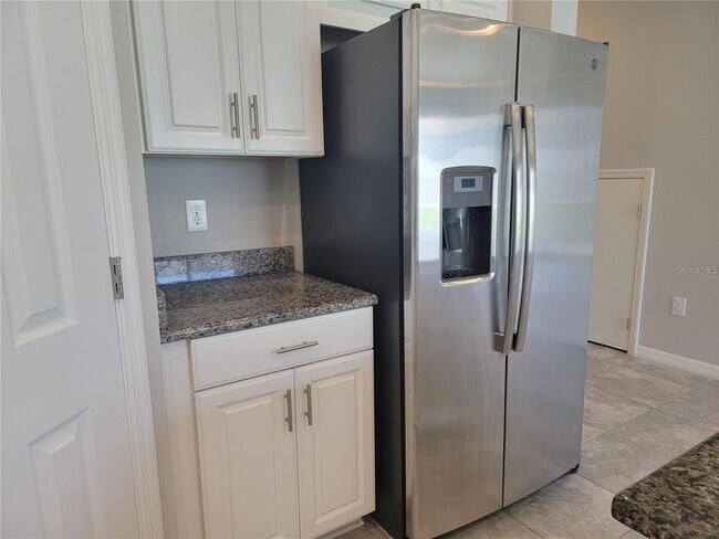 Building Photo - 7113 Grand Elm Dr