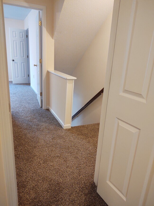 View to stairs from back room. - 251 Knight Dr