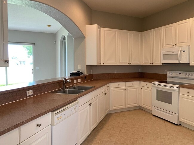 Building Photo - SPACIOUS 3/2 IN SAINT JAMES GOLF COMMUNITY