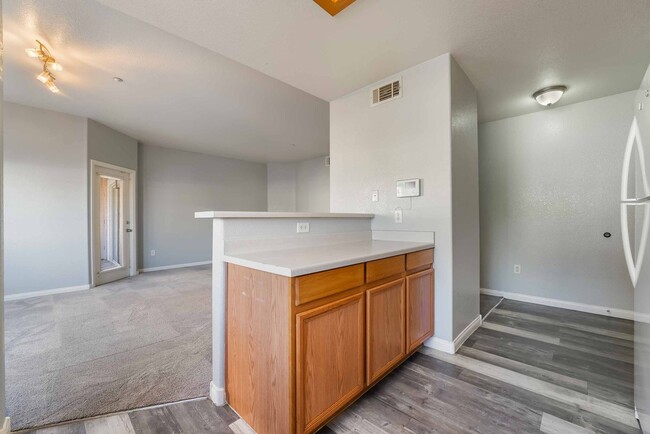 Building Photo - Stylish 1st-Floor Condo in Gated Community!