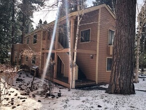 Building Photo - A quiet upstairs location with forest views