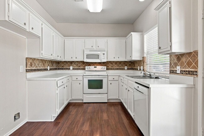 Building Photo - "Spacious Two-Story Home with Multiple Living Spaces and and Expansive Backyard!"
