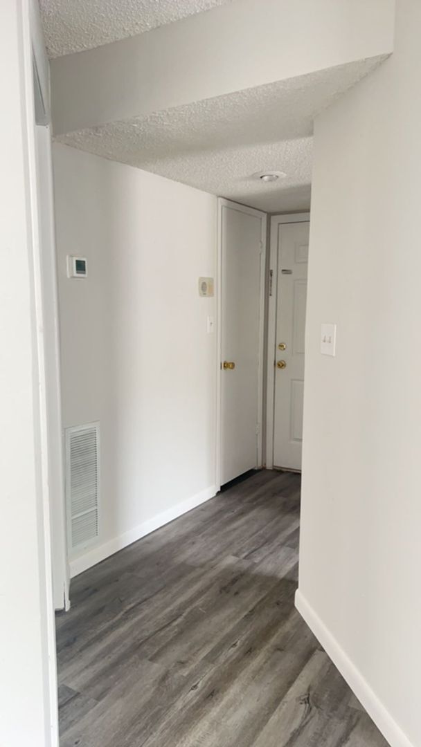 Building Photo - For Rent: 1 Bedroom, 1 Bath in a gated com...