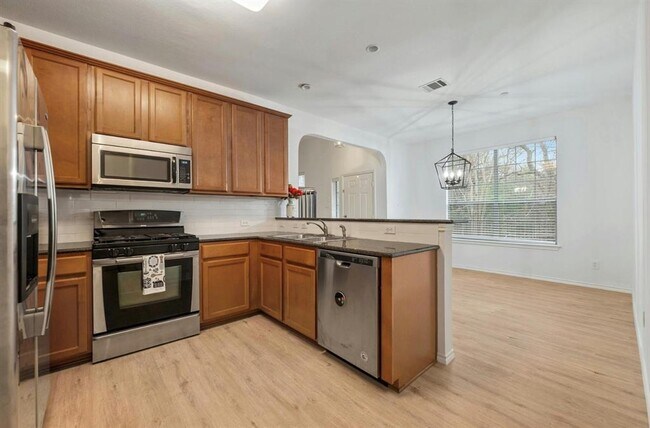 Building Photo - 1310 W Parmer Ln
