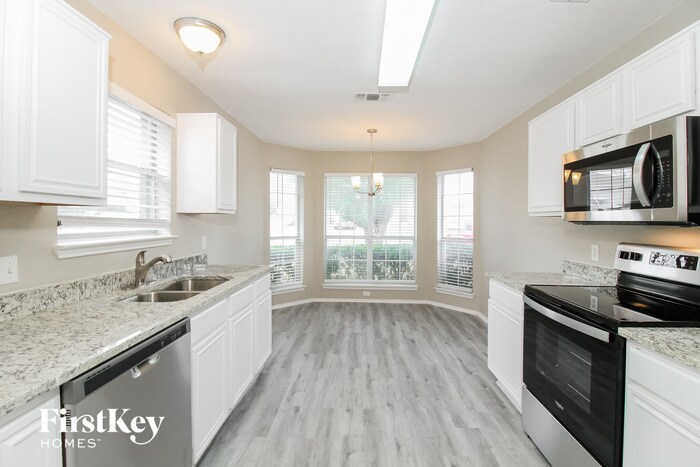 Building Photo - 6413 Riverwater Trail