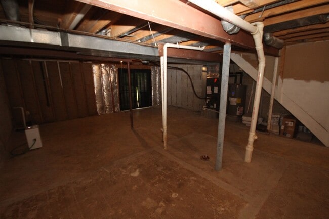 Building Photo - *Coming Soon*  Upgraded End Unit Townhome ...