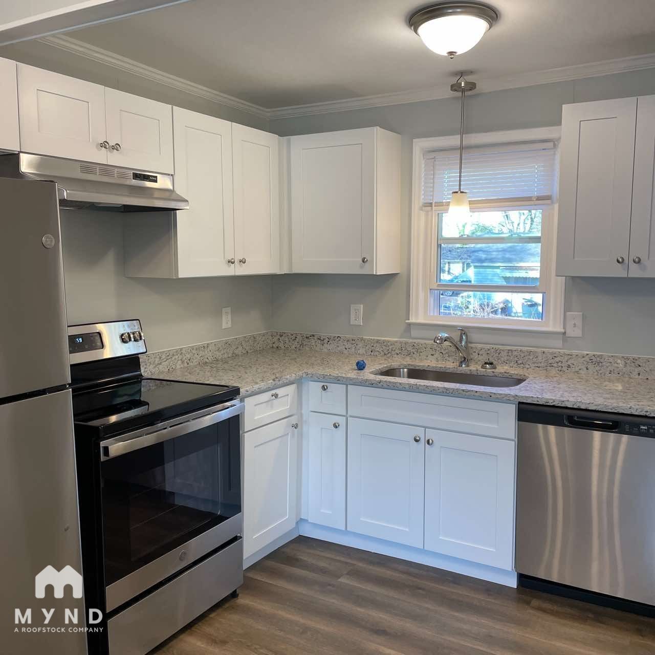 Building Photo - 514 E 12th Ave