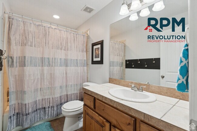 Building Photo - "Spacious 6-Bed Gem with Granite Touches & Cozy Fireplace in Morgan!"