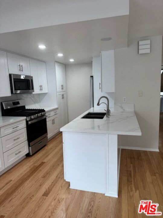 Building Photo - 13322 Maxella Ave