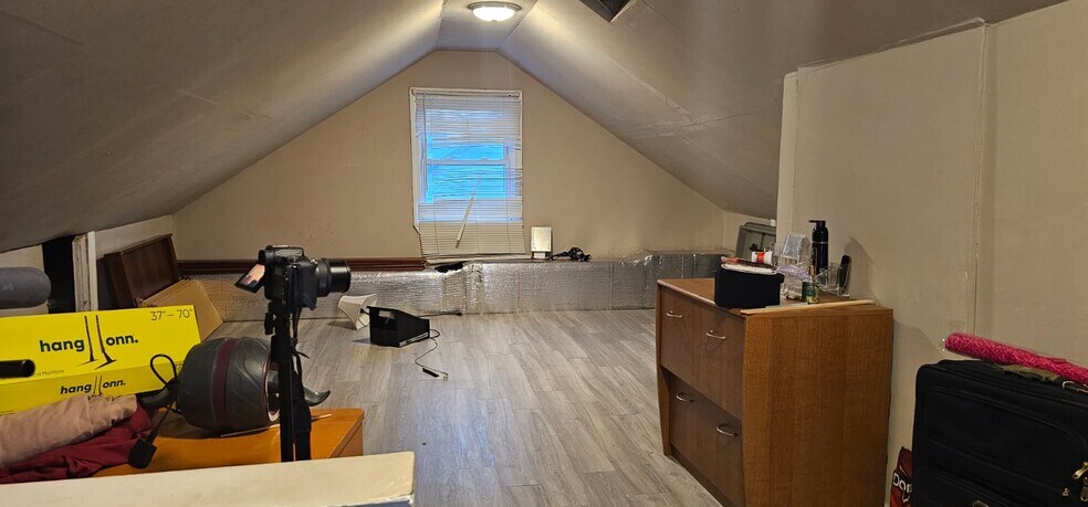 Attic is a BONUS room. Can be used for Work Space, Exercise Room, Storage. - 157 N 15th St