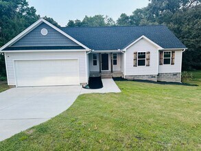 Building Photo - Spacious 4BR Home on 1.98 Acres with Modern Finishes in Tupelo Hills