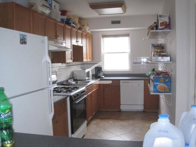 Building Photo - Looks better in Person.... Check out this 4 bed 2 bath Townhouse in Allston/Brighton