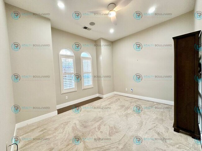 Building Photo - Open Kitchen, Expansive Living, and Covered Patio in Tranquil South Reno Near Trails, Parks & Sho...