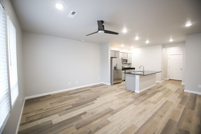 Building Photo - Baraya Townhomes: Modern Townhomes for Ren...