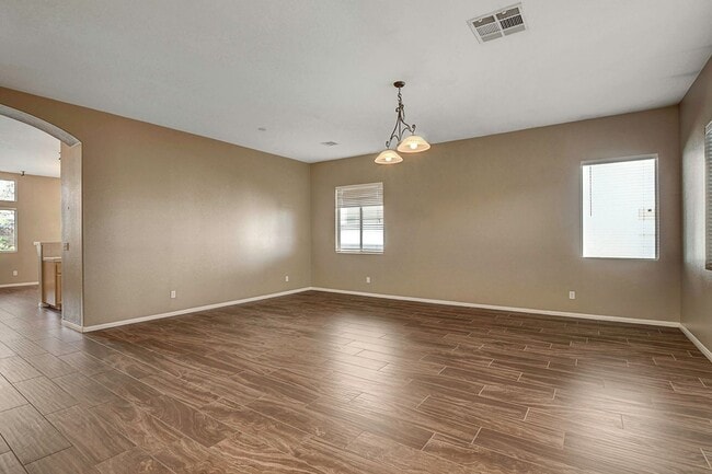 Building Photo - Gorgeous NW Single Story! 3 Car Garage! Serene Backyard.