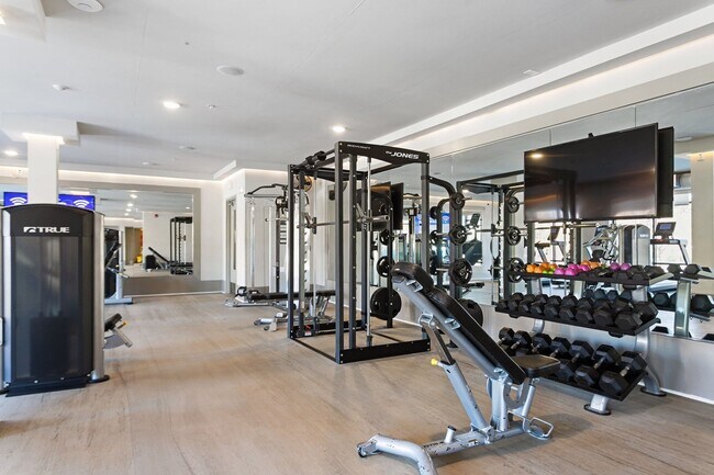 Fitness center featuring cardio equipment - Stadium Walk By Windsor